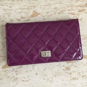 Authentic Patent Chanel bifold wallet in purple
